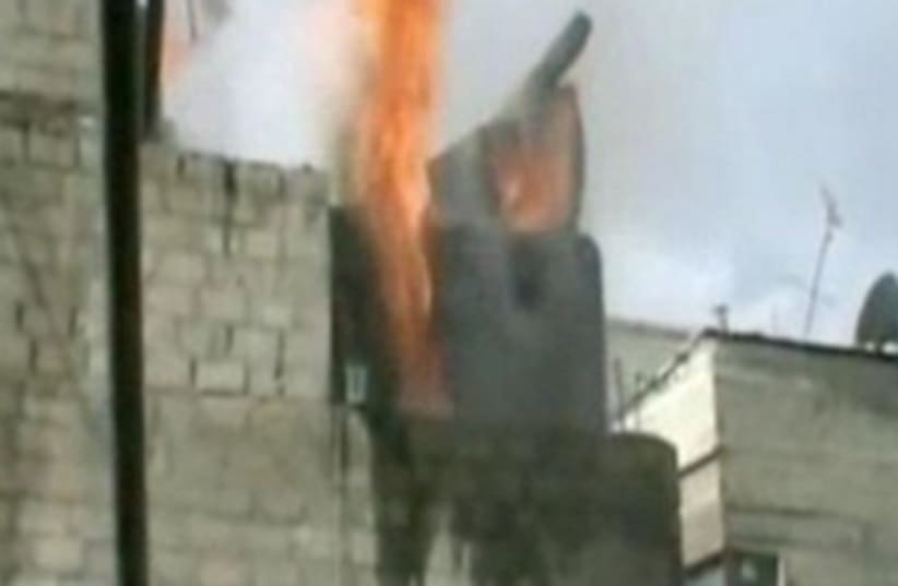 Syrian troops bombard areas in Damascus 370 (photo credit: Screenshot)