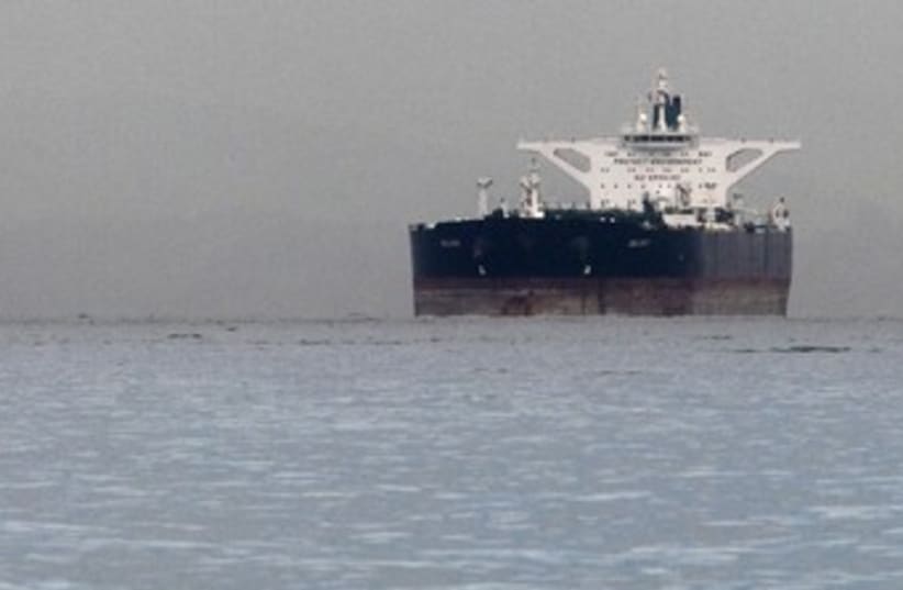 Malta-flagged Iranian crude oil supertanker 370 (R) (photo credit: Tim Chong / Reuters)