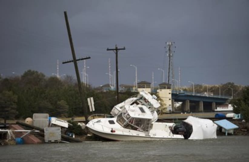 Boats and flotsam washed up by Hurricane Sandy 390 (photo credit: REUTERS)