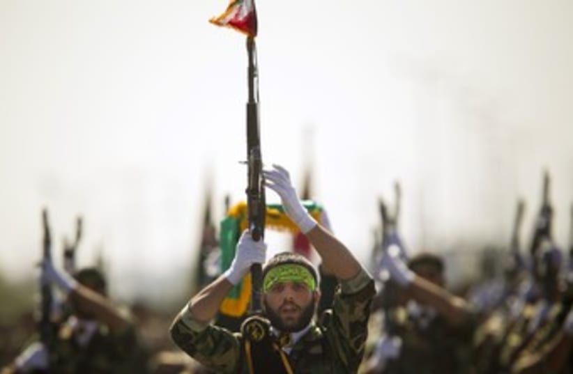Iran's Basij militia 370 (photo credit: REUTERS/Morteza Nikoubazl)