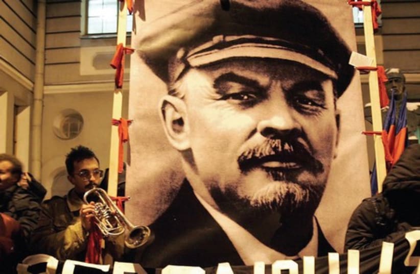 Protesters with Lenin poster 521 (photo credit: Reuters)