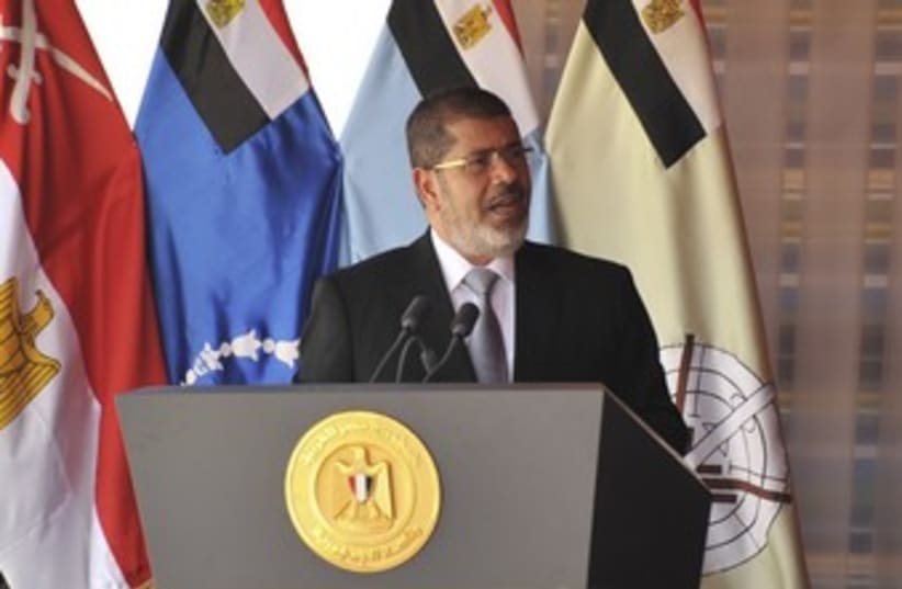 Egyptian President Mohamed Morsy 370 (R) (photo credit: REUTERS / Handout)