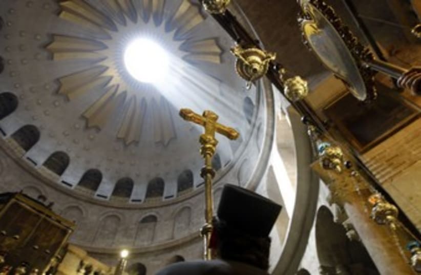 Mass at the Church of the Holy Sepulcher 370 (R) (photo credit: Ammar Awad / Reuters)