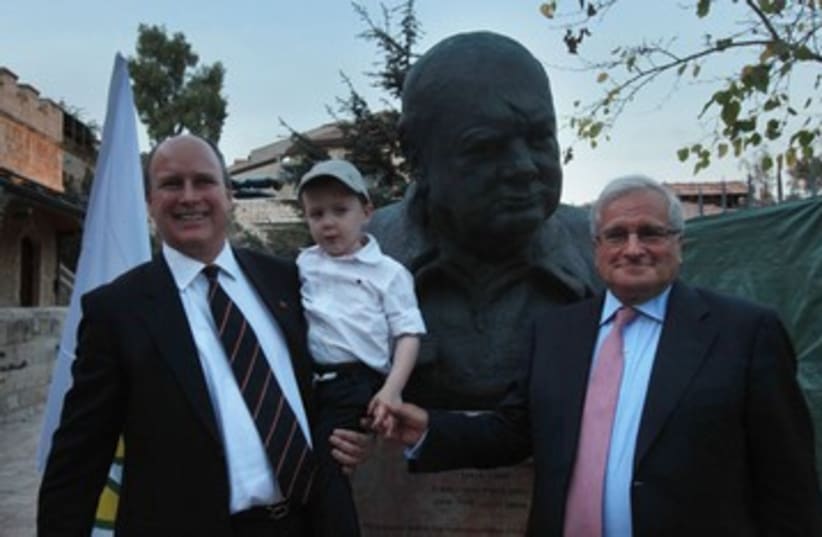 RANDOLPH CHURCHILL holds Isaac Winston in front of bust 370 (photo credit: Marc Israel Sellem/The Jerusalem Post)