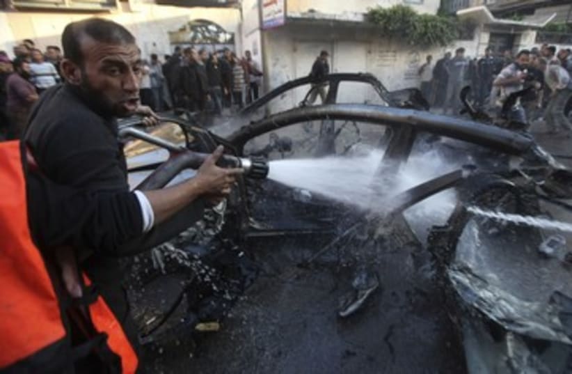 Car carrying Hamas commander Jabari hit by IDF 390 (photo credit: Reuters)