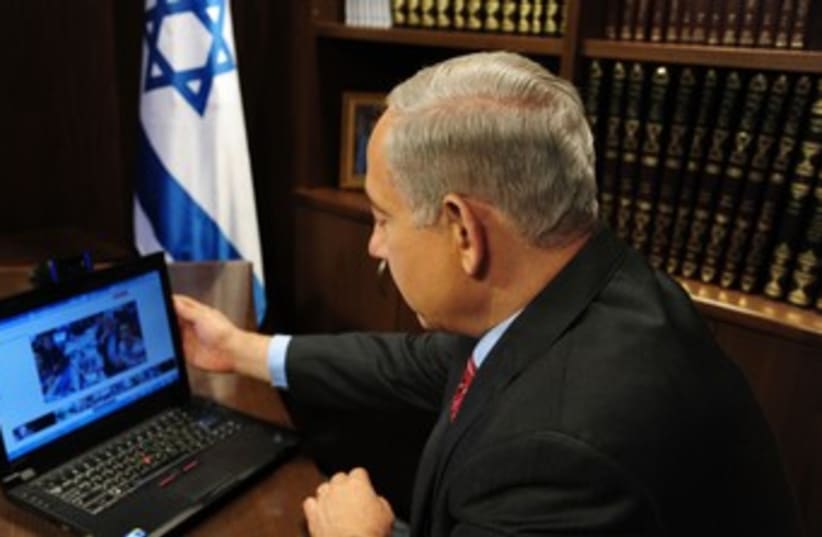 Netanyahu and laptop 370 (photo credit: Courtesy)