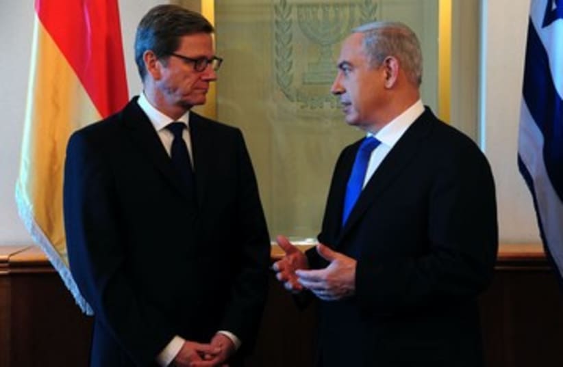 German FM Guido Westerwelle with PM Netanyahu 390 (photo credit: Koby Gidon/GPO)