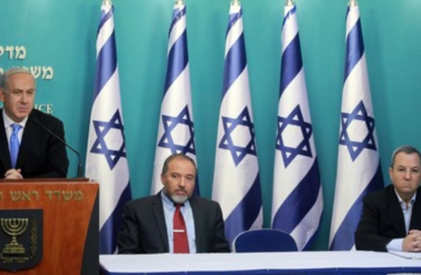 Netanyahu, Barak, Liberman press conference 390 (photo credit: Marc Israel Sellem/ The Jerusalem Post)