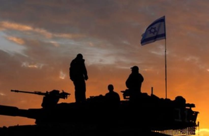 Reserve soldiers at sunset 370 (photo credit: REUTERS)
