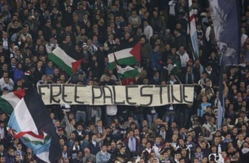 SS Lazio's fans display banner during Europa League match 37 (photo credit: REUTERS/Tony Gentile)