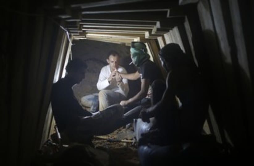 Gaza smuggling tunnel 370 (photo credit: Mohammed Salem / Reuters)