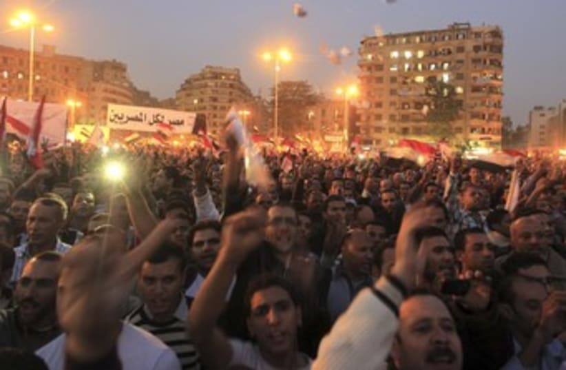 Anti Morsi protests in Tahrir Square Nov 27 370 (photo credit: REUTERS/Mohamed Abd El Ghany)