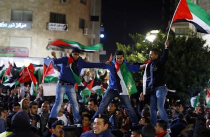 Palestinians celebrate UN statehood in Ramallah 370 (R) (photo credit: Marko Djurica / Reuters)