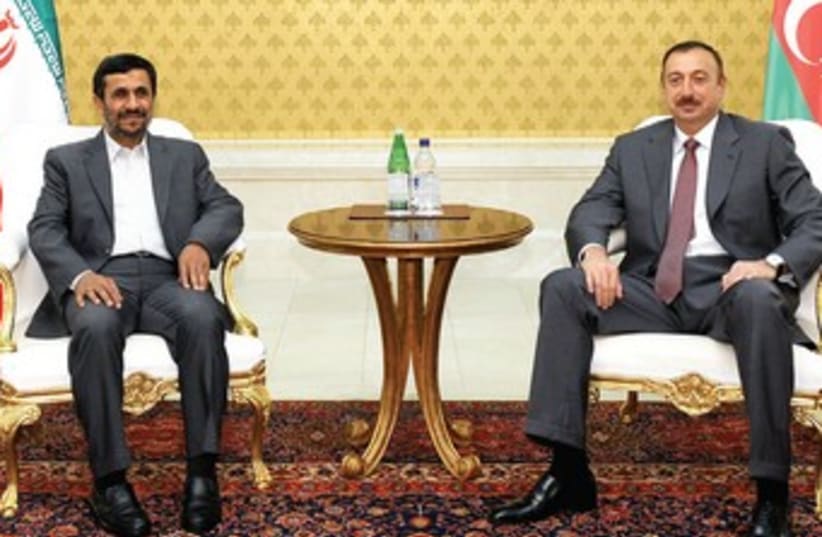 AZERBAIJAN’S PRESIDENT Ilham Aliyev with Ahmadinejad 370 (R) (photo credit: Vugar Amrullaev/Reuters)