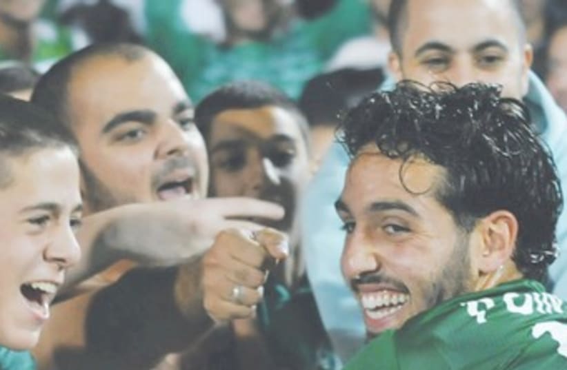 Maccabi Haifa celebrates derby win 370 (photo credit: Uzi Gal)