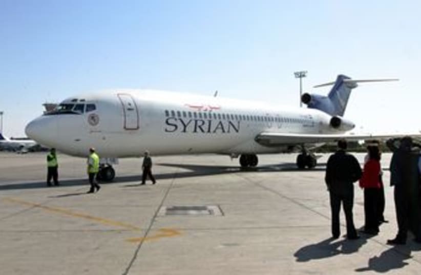A Syrian airplane at Damascus Airport 370 (R) (photo credit: Khaled Al Hariri / Reuters)