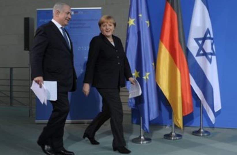 Merkel and PM 370 (photo credit: GPO)