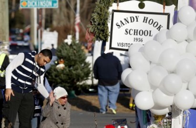 Memorial Sandy Hook Elementary School 150 (photo credit: REUTERS/Shannon Stapleton)