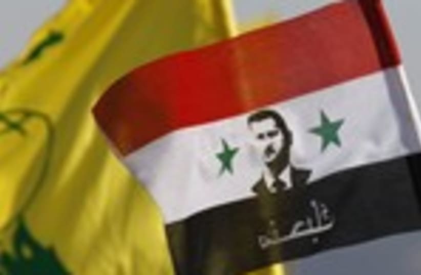 Flags of Hezbollah, Assad's Syria 150 (photo credit: REUTERS/Ali Hashisho)