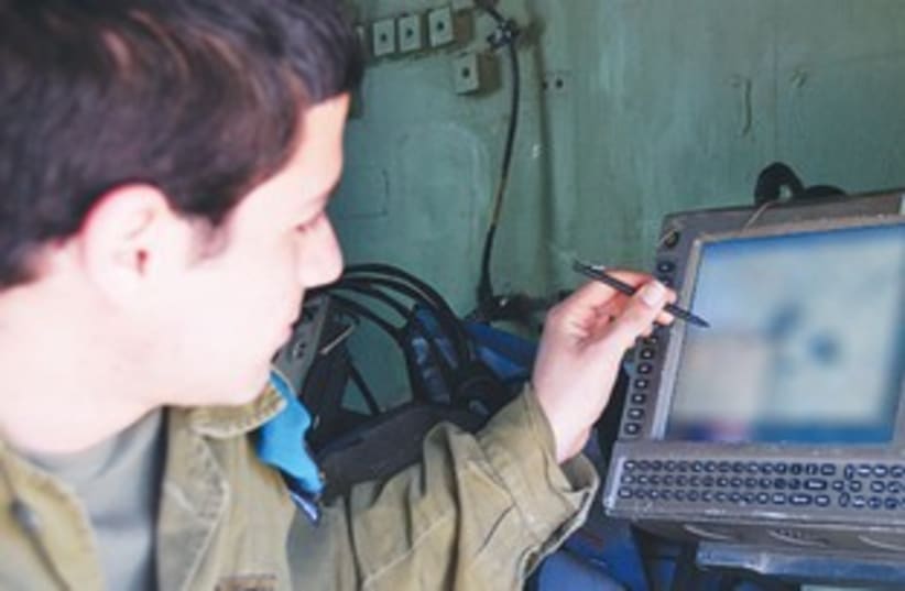 AN IDF soldier uses the ‘Digital Ground Army’ system 370 (photo credit: IDF Spokesman)