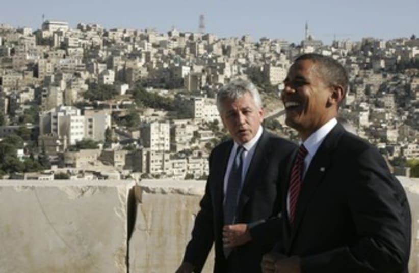 Obama laughs with Hagel in Amman 370 (photo credit: REUTERS/Majed Jaber)