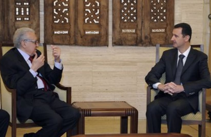Brahimi and Assad 370 (photo credit: REUTERS/Sana Sana)