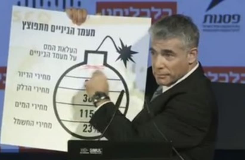Yair Lapid with bomb cartoon 370 (photo credit: Screenshot)