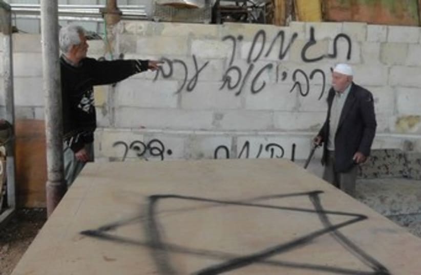 "Price tag" graffiti in Beit Ummar 370 (photo credit: Manal Jabari/ B'Tselem)