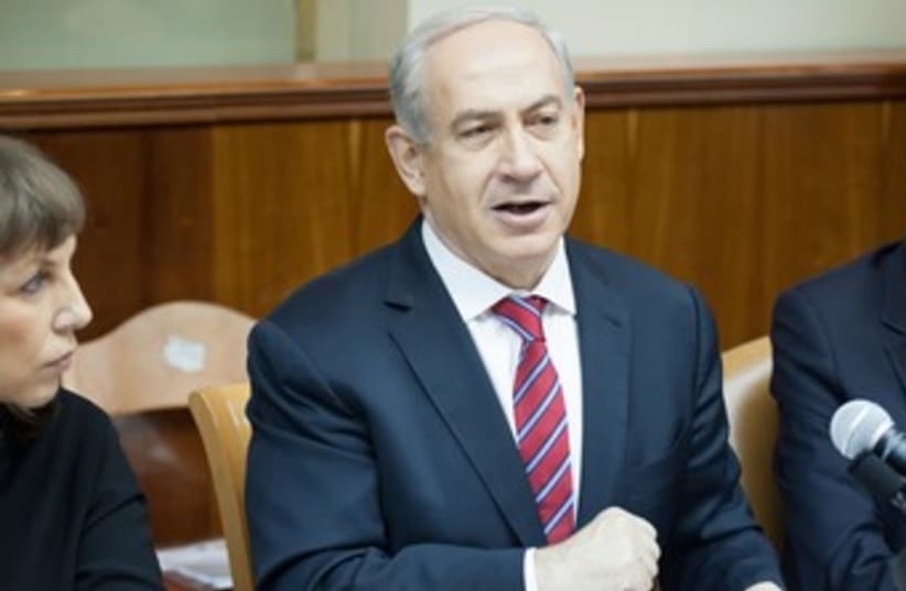 PM Netanyahu at cabinet meeting 370 (R) (photo credit: Pool / Emil Zalman / Haaretz)