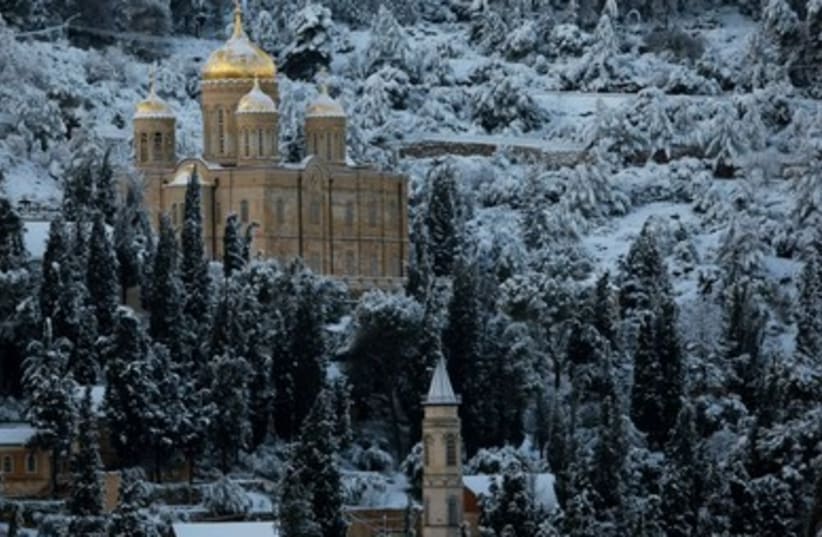Snow covers the Russian Church 390 (photo credit: Reuters/Ronen Zvulun)