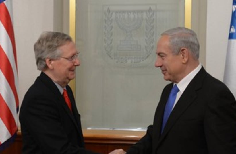Netanyahu shakes hands with McConnell 370 (photo credit: GPO)