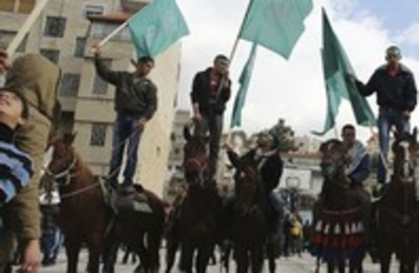 Hamas supporters rally in Hebron 300 (photo credit: REUTERS)