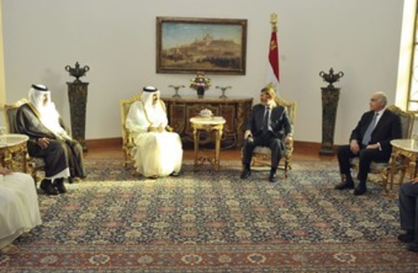 Egypt's Morsi meets with Qatari PM 370 (photo credit: REUTERS)