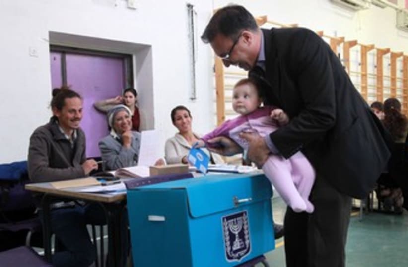 Father and daughter vote 370 (photo credit: Marc Israel Sellem/The Jerusalem Post)