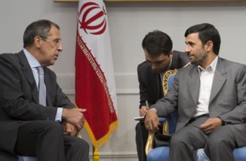 Sergei Lavrov with Ahmadinejad 370 (photo credit: REUTERS/Morteza Nikoubazl)
