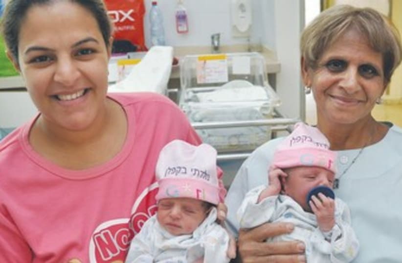 Twin girls born in emergency delivery 370 (photo credit: Courtesy Kaplan Medical Center)