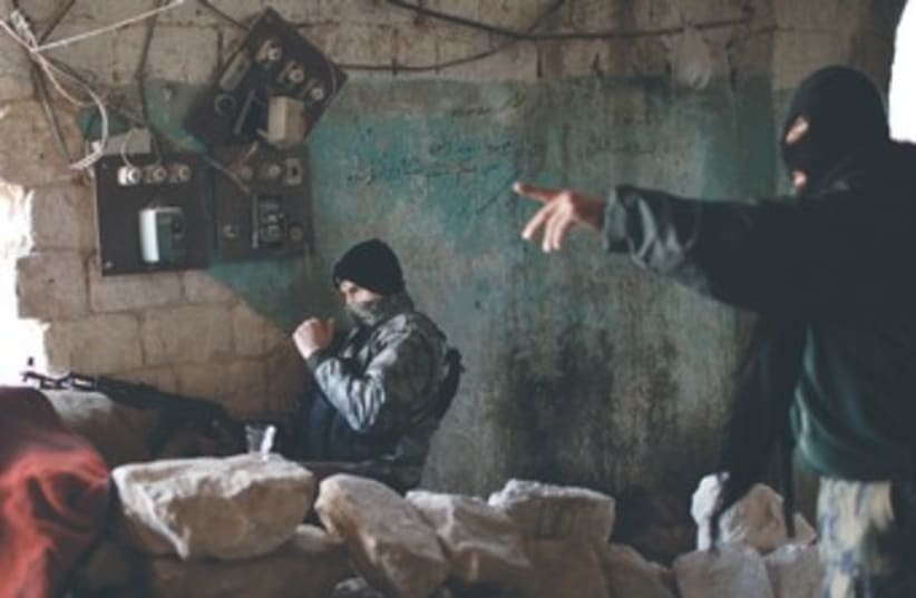 Jabhat al-Nusra fighters 370 (photo credit: Ahmed Jadallah/Reuters)
