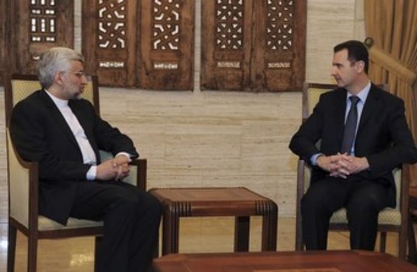 Assad meets with Iran's Jalili 370 (photo credit: REUTERS/Sana)