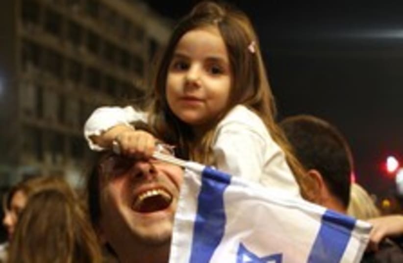 israeli flag girl 224 88 (photo credit: Ariel Jerozolimski)