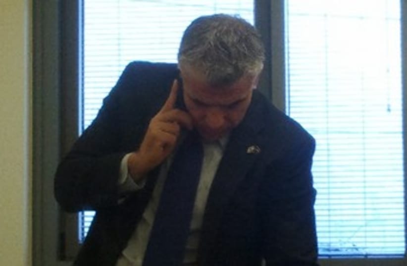 Lapid talking to Pollard on the phone 370 (photo credit: Courtesy Justice for Jonathan Pollard)