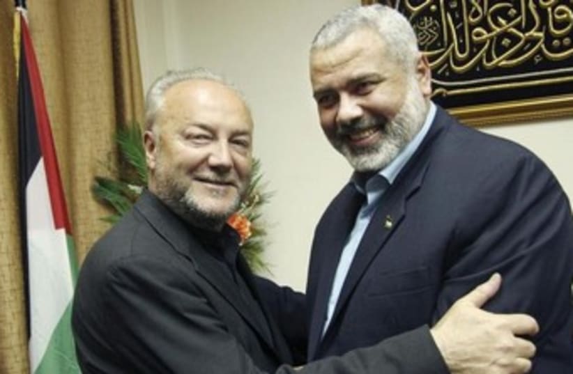 British MP George Galloway with Hamas PM Ismail Haniyeh 370 (photo credit: REUTERS/Mohammed al-Ostaz/Handout)