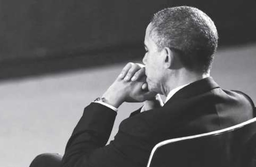 Gloomy Obama 521 (photo credit: KEVIN LAMAR QUE / REUTERS)
