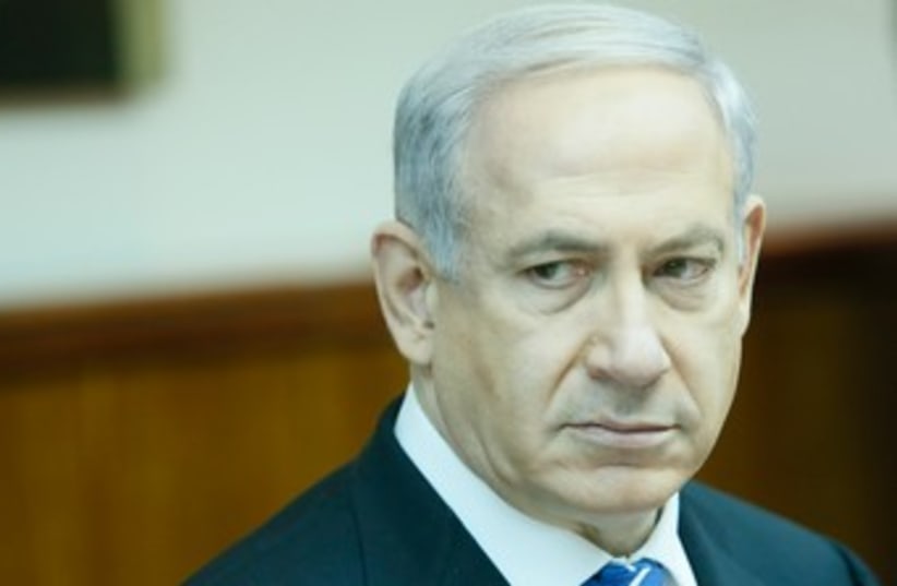 Netanyahu looking morose at cabinet meeting 370 (photo credit: GPO)