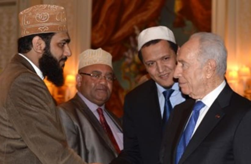 President Shimon Peres meets in Paris with Immams 370 (photo credit: GPO / Moshe Milner)