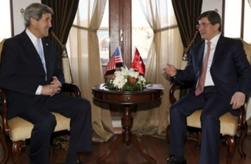 US Secretary of State Kerry with Turkish FM Davutoglu (photo credit: REUTERS/Jacquelyn Martin/Pool)