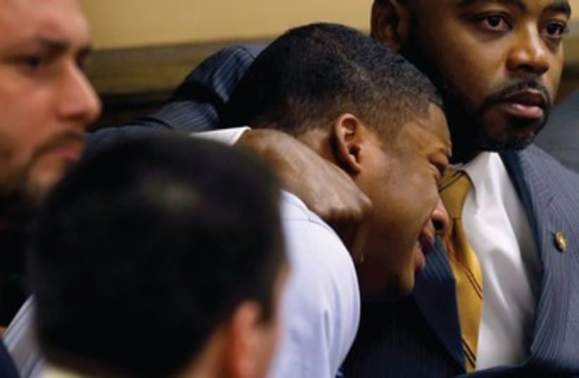 MA’LIK RICHMOND cries after hearing verdict in rape case 370 (photo credit: reuters)