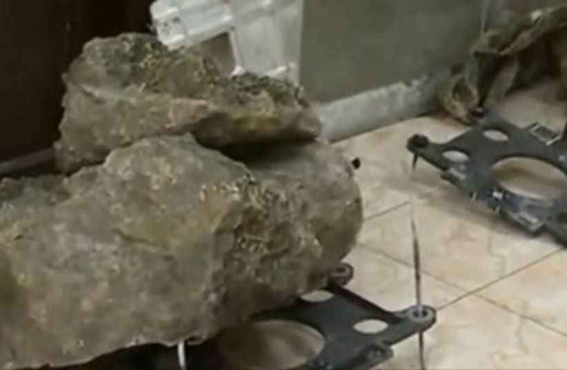 Alleged Israeli fake rock for spying 370 (photo credit: YouTube Screenshot)