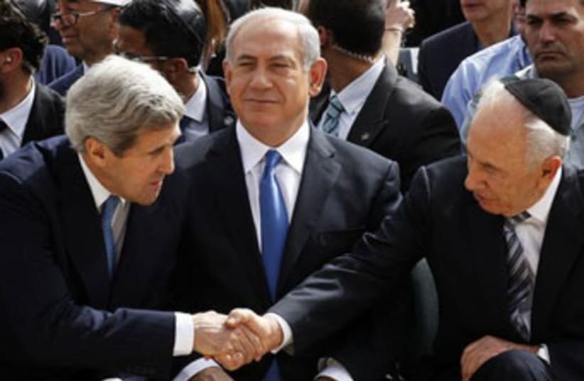 Kerry Peres Netanyahu yom hashoah 8413 370 (photo credit: Reuters)