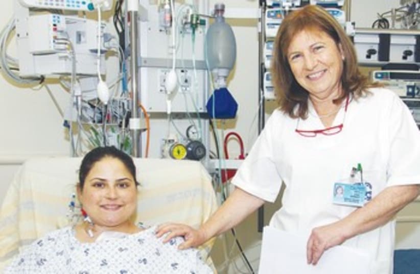 TRANSPLANT COORDINATOR Yedida Shemesh with Dikla Cohen 370 (photo credit: Sheba Medical Center)