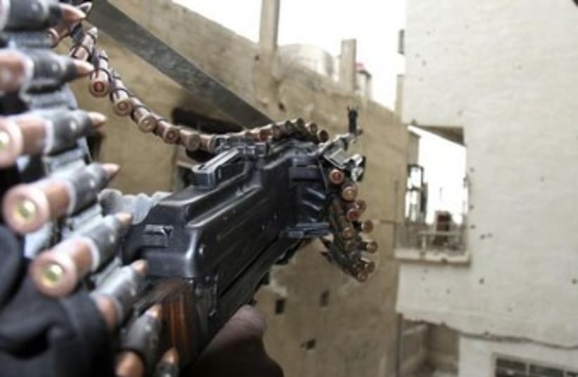 Syrian opposition fighter (photo credit: REUTERS/Ward Al-Keswani)